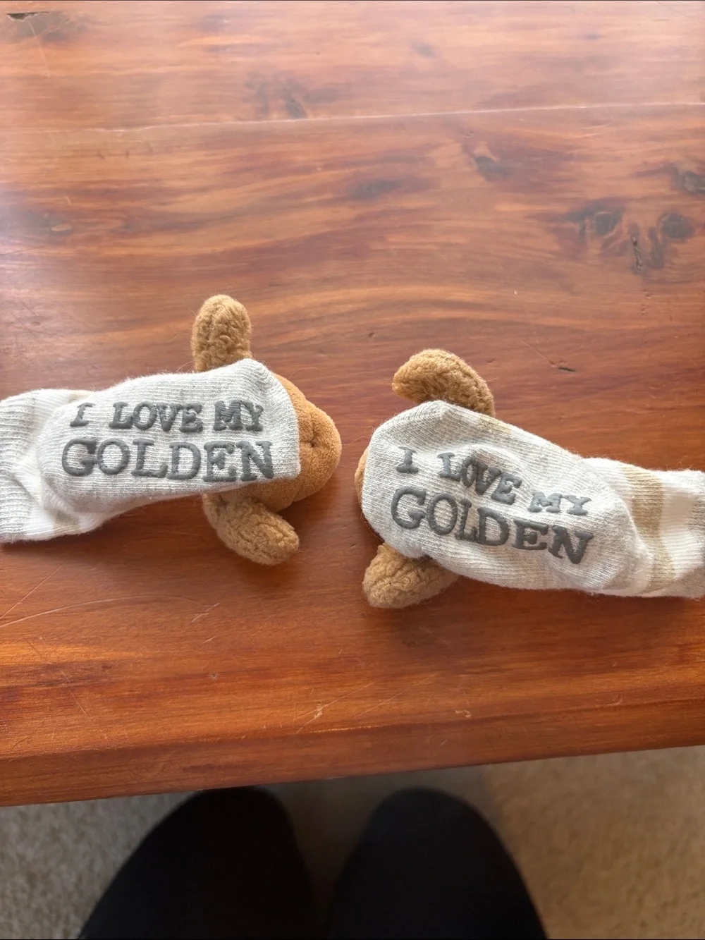 Infant socks with Golden Retriever rattle detail.